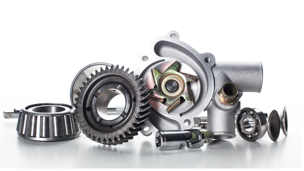 Exploded view of a diesel turbocharger showing the CHRA, compressor wheel, turbine housing and VGT actuator that drive its cost